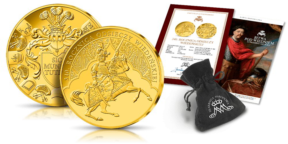 Złote monety kolekcjonerskie z oferty Skarbnicy Narodowej prezentowane w eleganckim futerale.